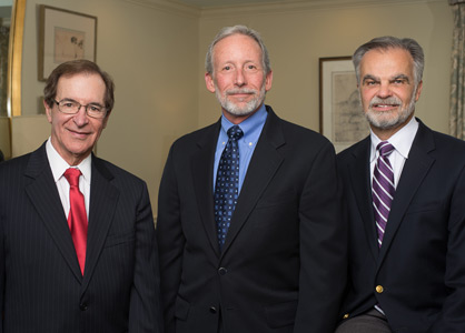 Group photo of our doctors wearing dark suits