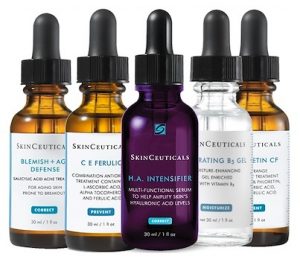 Bottles of skinceuticals products with droppers on the top